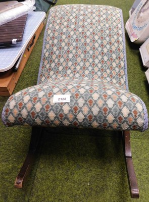 Lot 2128 - A mahogany framed gout stool, on a rocker base.