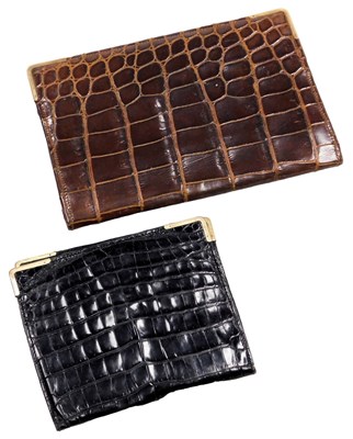 Lot 688 - A crocodile skin wallet, with 9ct gold corner...