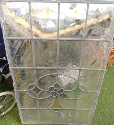 Lot 2144 - A stained and clear glass leaded window panel,...