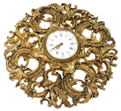 Lot 426 - A Jaeger electronic wall clock, circular white...