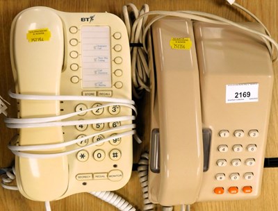 Lot 2169 - Two wall mounted telephones.