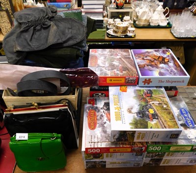 Lot 2218 - A group of jigsaw puzzles, predominantly train...
