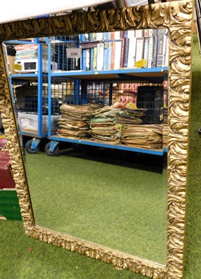 Lot 2248 - A gilt framed wall mirror, with acanthus leaf...