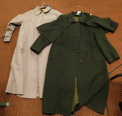Lot 2280 - A Rowland's green wool coat and cape, underarm...
