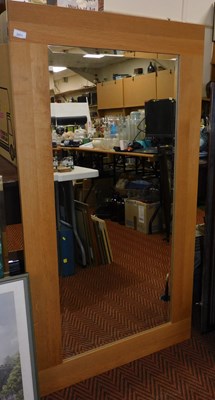 Lot 2311 - An oak framed rectangular wall mirror, 146cm x...