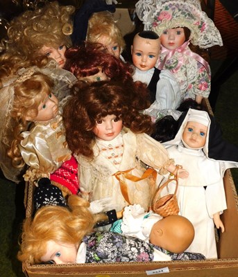 Lot 2334 - Various dolls, to include a doll in a nun's...