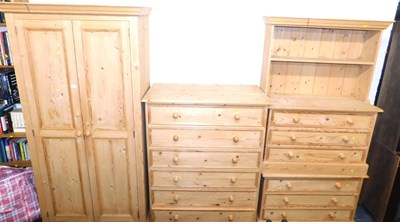 Lot 1001 - A pine bedroom suite, comprising a double...