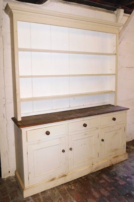 Lot 1003 - A painted pine dresser, the top with a moulded...