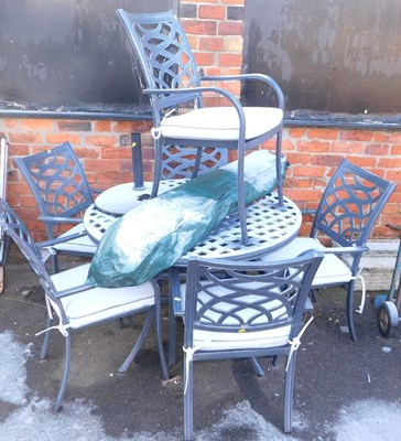 Lot 1012 - An aluminium garden suite, comprising a...