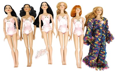 Lot 449 - Six Tonner dolls, wearing pink silk and lace...