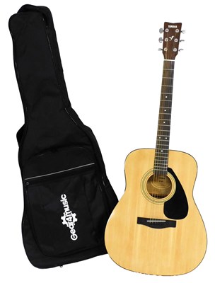 Lot 456 - A Yamaha F310 acoustic guitar, 102cm high,...