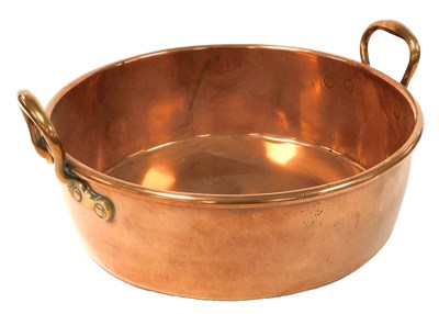 Lot 463 - A copper twin-handled jam pan, number 17 to...
