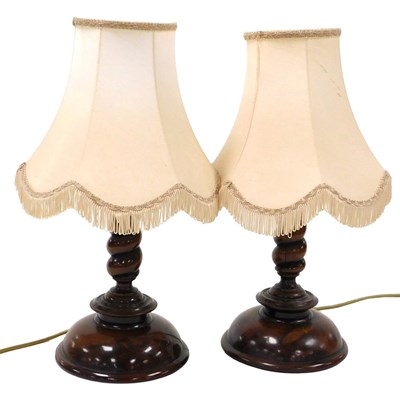 Lot 465 - A pair of turned fruitwood table lamps, with...