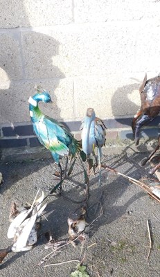 Lot 1024 - A group of painted metal garden ornaments, to...