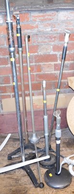Lot 1040 - A group of microphone stands.