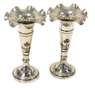 Lot 469 - A pair of Egyptian niello vases, of flared...