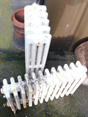 Lot 1066 - Two cast iron radiators, 45cm high, 62cm...