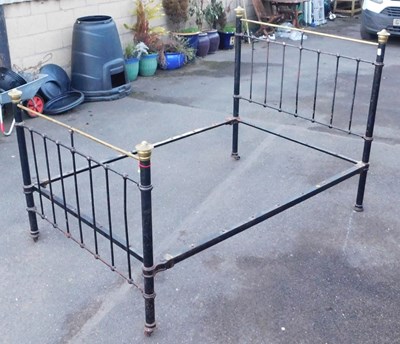 Lot 508 - A Victorian black painted cast iron and brass...