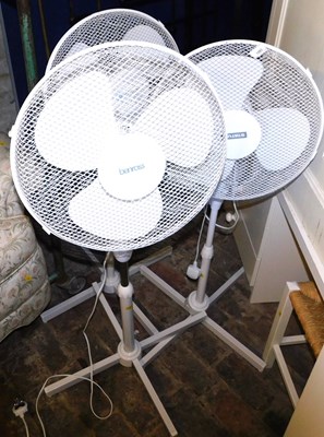 Lot 1083 - Three electric floor standing fans, Status,...