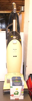 Lot 1100 - A Miele S7210 upright vacuum cleaner, together...
