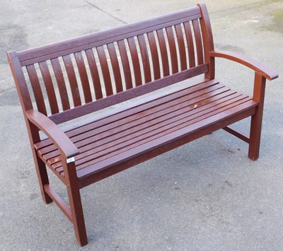 Lot 506 - A dark stained oak wooden three seater bench,...