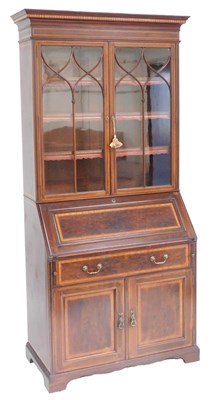 Lot 520 - An Edwardian mahogany bureau bookcase, with...