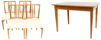 Lot 529 - A Gordon Russell teak draw leaf dining table,...