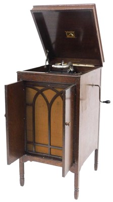 Lot 544 - An early 20thC HMV oak cased cabinet...