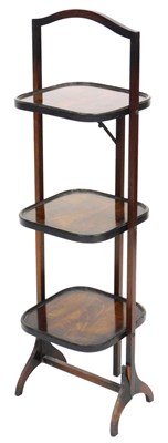 Lot 549 - An Edwardian mahogany three tier folding cake...