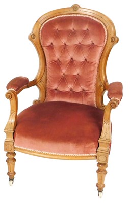 Lot 859 - A Victorian mahogany spoon back open armchair,...