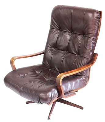 Lot 565 - A mid century bentwood and brown leather...