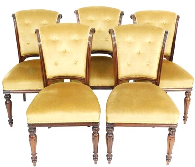 Lot 857 - A set of five late Regency mahogany scroll...