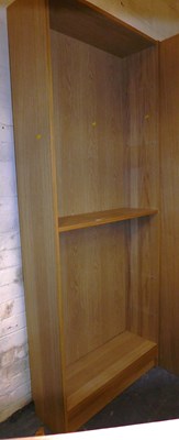 Lot 1133 - An oak veneer open bookcase, 200cm high x 80cm...