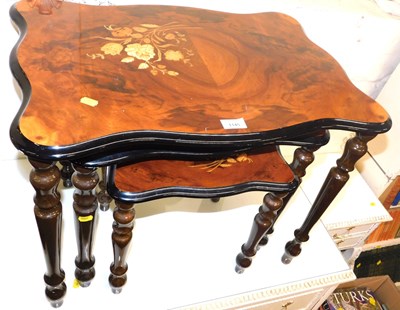 Lot 1145 - A nest of three Italian tables, each with a...