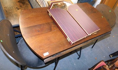 Lot 1151 - A contemporary hardwood drop leaf dining table,...