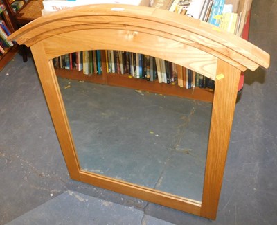 Lot 1155 - An oak framed wall mirror, 102cm x 98cm.