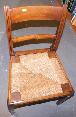 Lot 1158 - A mahogany dining chair, with a rush seat.