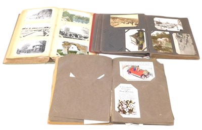 Lot 180A - Deltiology postcards. Three albums of...