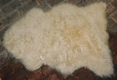 Lot 1082 - A sheepskin rug.