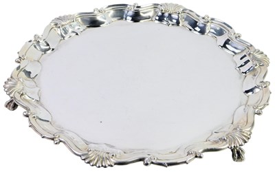 Lot 6 - A Victorian silver salver, with a piecrust...