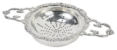 Lot 64 - An Elizabeth II silver twin handled tea...
