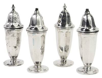 Lot 209 - A pair of George VI silver pepper pots and...