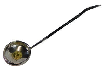 Lot 210 - A George III silver toddy ladle, with a...