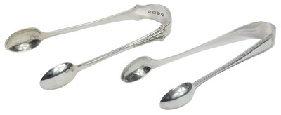 Lot 230 - A pair of George V silver sugar tongs, John...