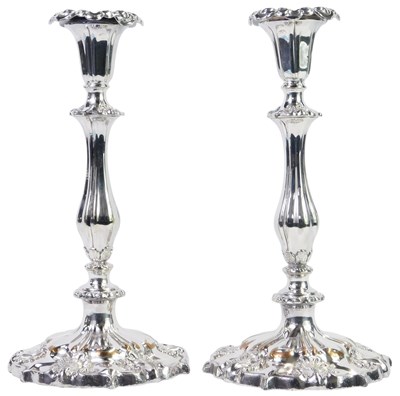 Lot 232 - A pair of Victorian silver plated candlesticks,...