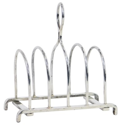 Lot 233 - A silver four division toast rack, stamped...