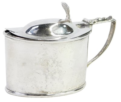 Lot 234 - An Edward VII silver lidded mustard pot, of...