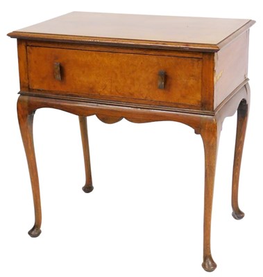 Lot 570 - An early 20thC walnut side table, with a...