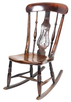 Lot 573 - A Victorian oak and elm Windsor rocking chair,...