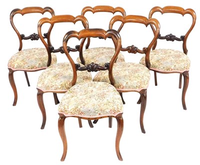 Lot 584 - A set of six Victorian rosewood balloon back...
